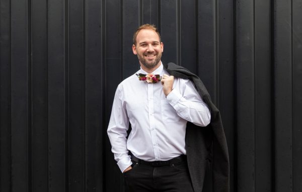 Groom with floral bowtie