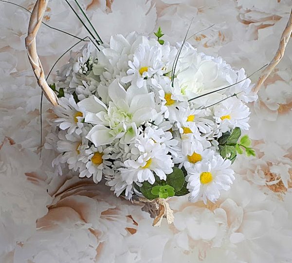 Basket filled with silk daisies