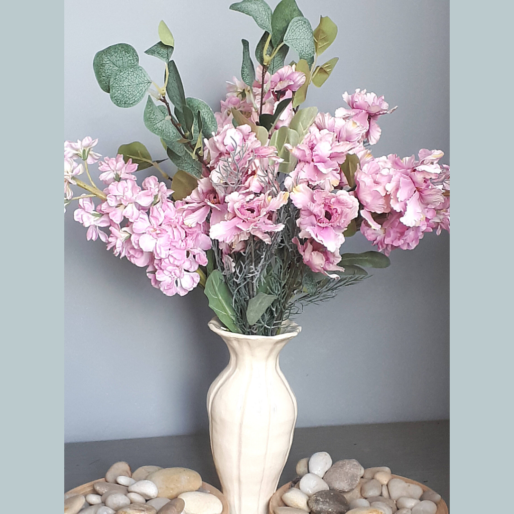 Vase of pink blossom