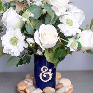 White flowers in a blue vase