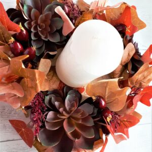 Image of autumn table centre with huge faux burgundy succulents