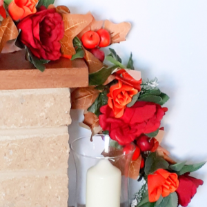 Autumn mantel garland of autumn ivy leaves, red silk rose and orange silk rose