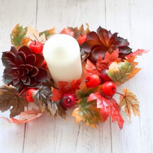 Image of autumn table centre with faux burgundy succulents