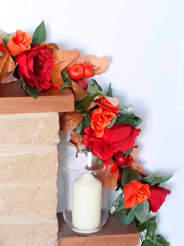 Autumn mantel garland of autumn ivy leaves, red silk rose and orange silk roses