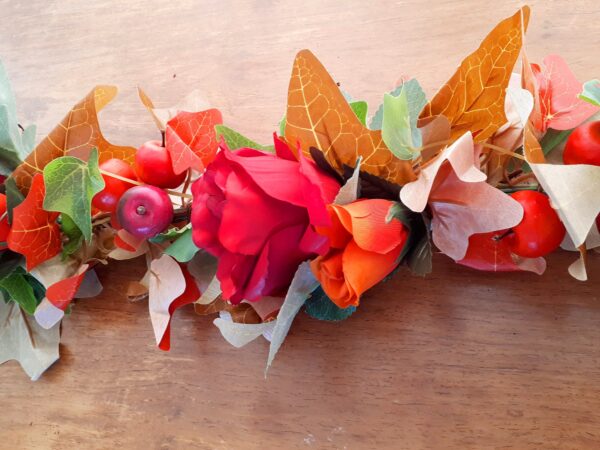 Autumn mantel garland of autumn ivy leaves, red silk rose and orange silk rose