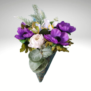 Wall hanging ceramic vase with purple silk flowers