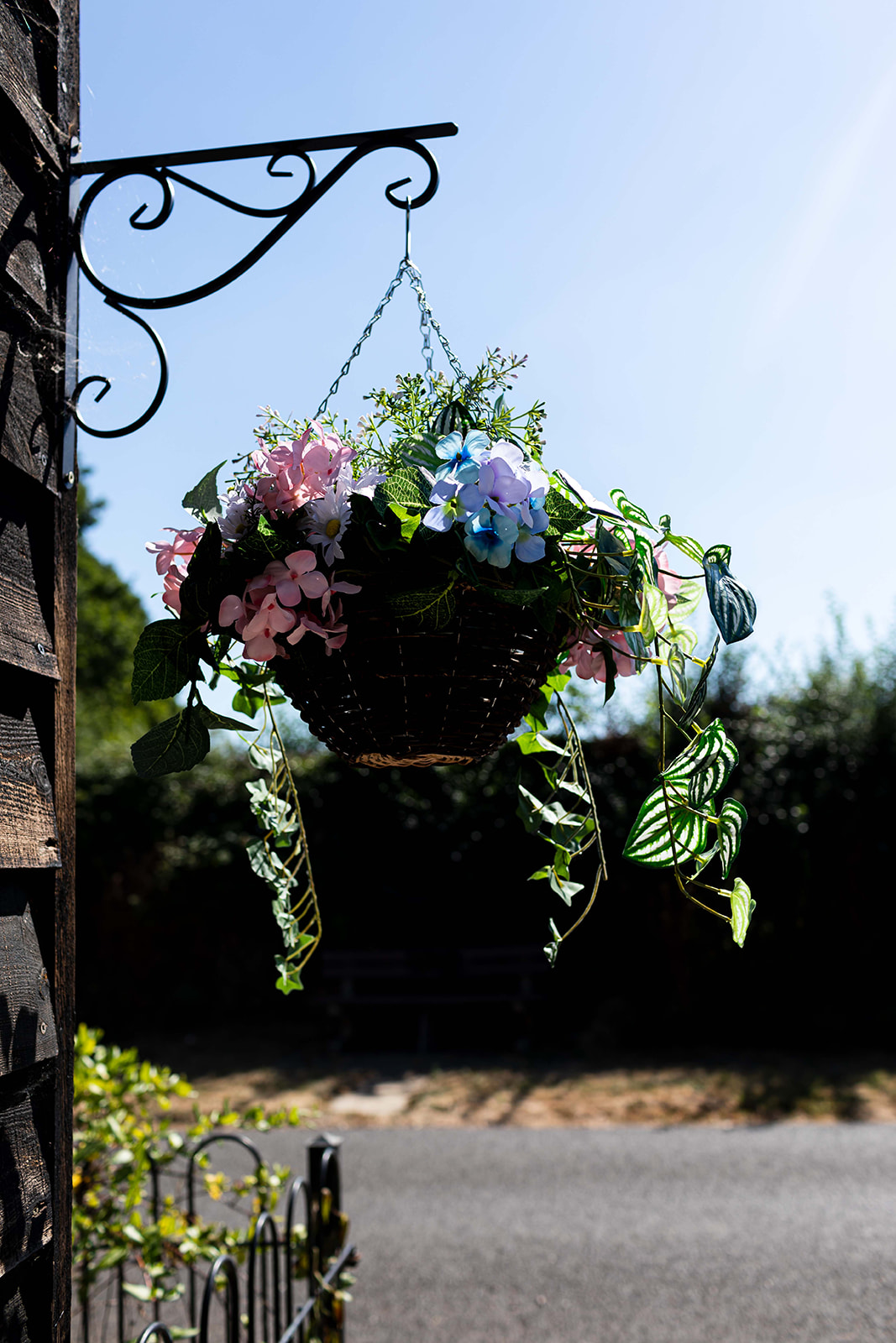 Hanging basket with pink and blue silk hydrangeas