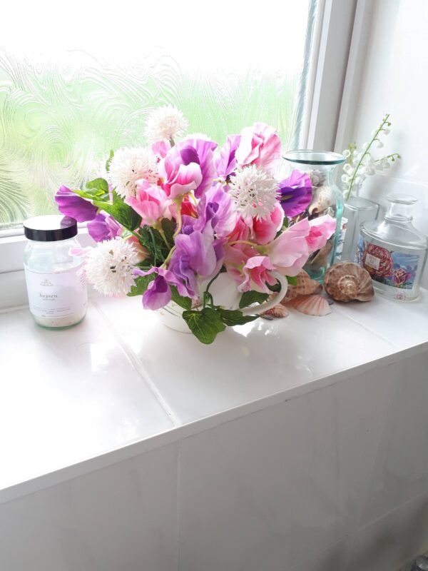 Image of pink and mauve sweet peas with pale pink faux alliums