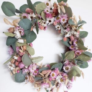 Image of wreath with pink and white everlasting flowers, natural quaking grasses and green eucalyptus