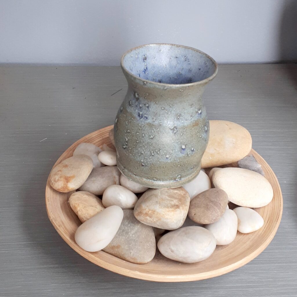 Image of small ceramic bud vase with blue grey glaze