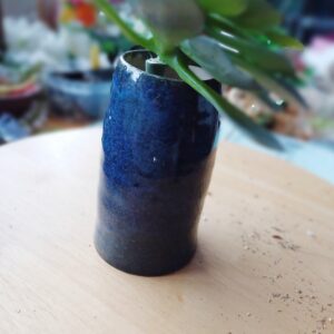 Image of a small bud ceramic vase in deep blue