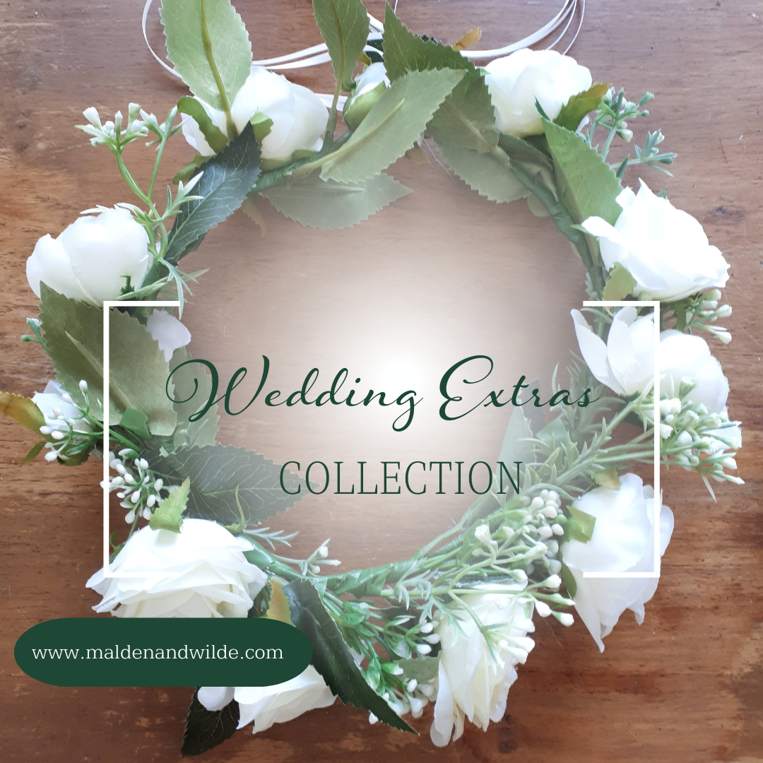 Image of a flower crown with white roses, and the words Wedding Extras collection