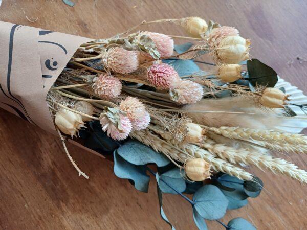 Image of dried grasses and flowers, blue, pale pink and neutral colours