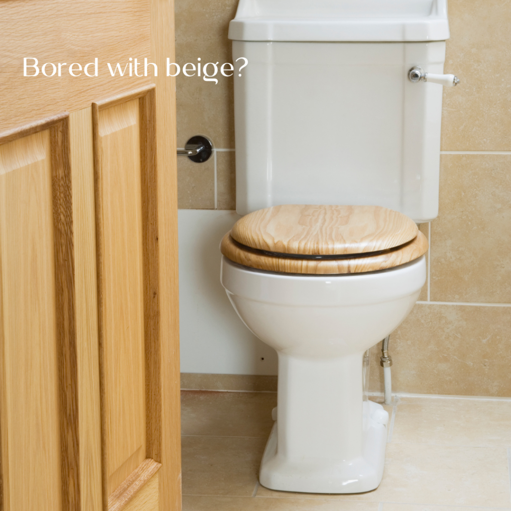 Image of a downstairs toilet with beige tiles and a wooden toilet seat