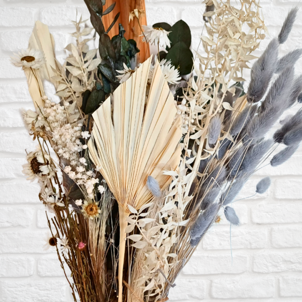 Image of large luxury bunch of grey and cream dried grasses and dried flowers