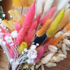 Dyed lagurus (bunny tail) grasses with quaking grasses and white dried flowers