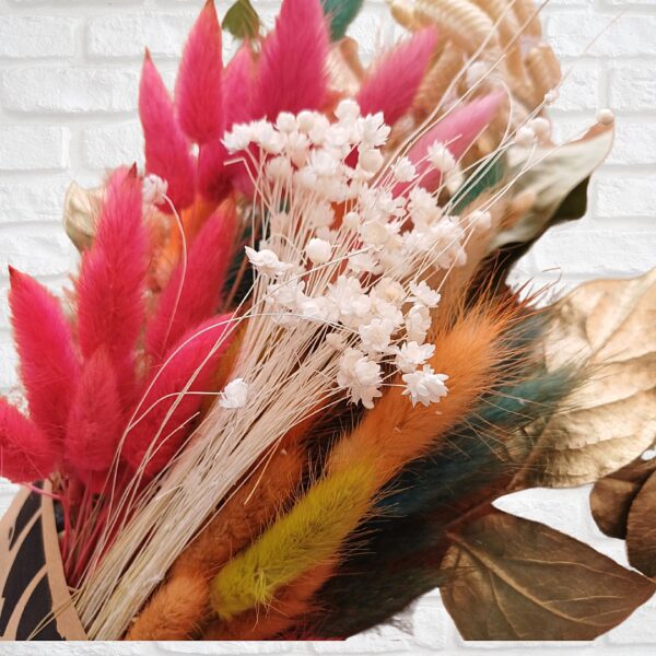 Dyed lagurus (bunny tail) grasses with quaking grasses and white dried flowers