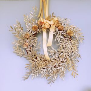 Gold leaf winter wreath with natural mini pine cones