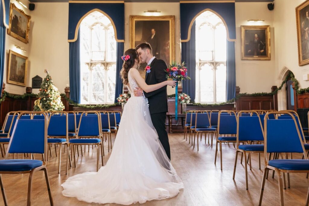 Wedding couple and the first kiss