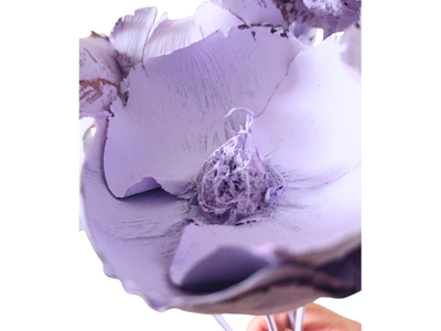 Pale lilac dried palm cup showing texture