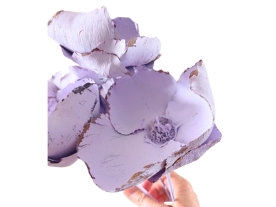 Pale lilac dried palm cup showing texture