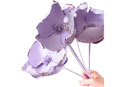 Pale lilac dried palm cup showing texture and wooden stems