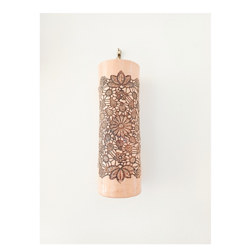 Ceramic wall vase with lace design