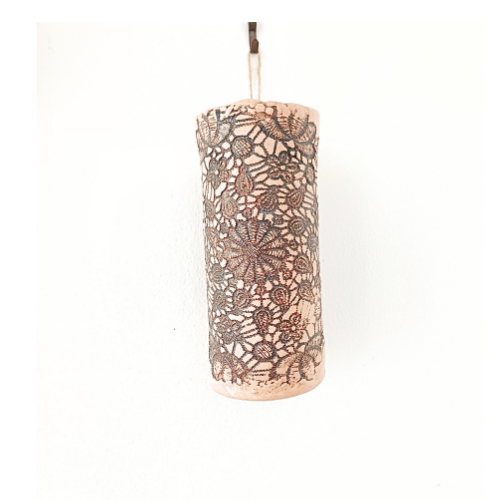 Ceramic wall vase with lace design